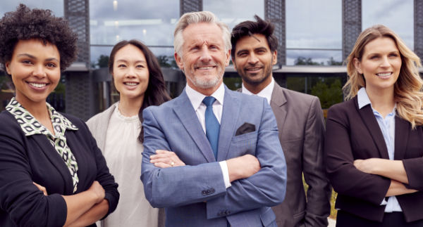 Portrait Of Multi-Cultural Business Team Outside Modern Office Building
