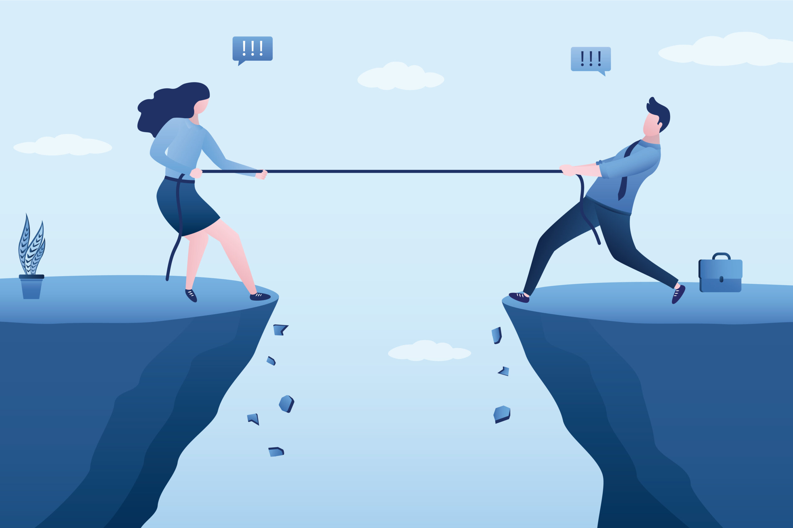 business people tug of war at cliffs edge